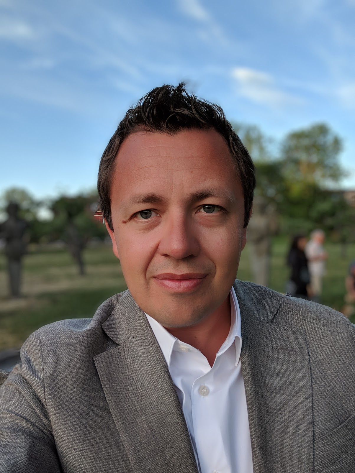 Ken in suit during consulting years